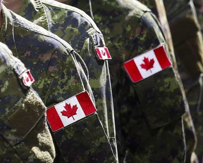 Members of the Canadian Armed Forces march in Calgary on July 8, 2016. THE CANADIAN PRESS/Jeff McIntosh