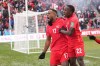 Canada's Cyle Larin (17) celebrates his goal with Richie Laryea against Jamaica during first half CONCACAF World Cup soccer qualifying action in Toronto on Sunday, March 27, 2022.&nbsp;Canada will get a taste of World Cup opposition in September with games in Europe against Qatar and Uruguay ahead of the men's soccer showcase in Qatar in November. THE CANADIAN PRESS/Nathan Denette