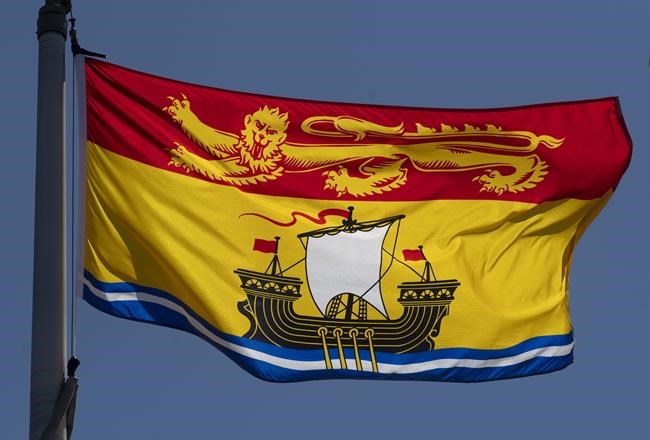 New Brunswick's provincial flag flies in Ottawa, Monday, July 6, 2020.The New Brunswick government is designating nearly 100-thousand hectares of newly protected areas as part of its commitment to double protected lands and waters in the province.THE CANADIAN PRESS/Adrian Wyld