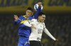Du Queiroz of Brazil's Corinthians, right, and Marcos Rojo of Argentina's Boca Juniors go for a header during a Copa Libertadores round of sixteen soccer match in Buenos Aires, Argentina, Tuesday, July 5, 2022. (AP Photo/Victor R. Caivano)