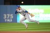 Kansas City Royals shortstop Bobby Witt Jr throws to first base too late to put out Toronto Blue Jays centre fielder George Springer in fifth inning American League baseball action in Toronto, Sunday, July 3, 2022. THE CANADIAN PRESS/Jon Blacker