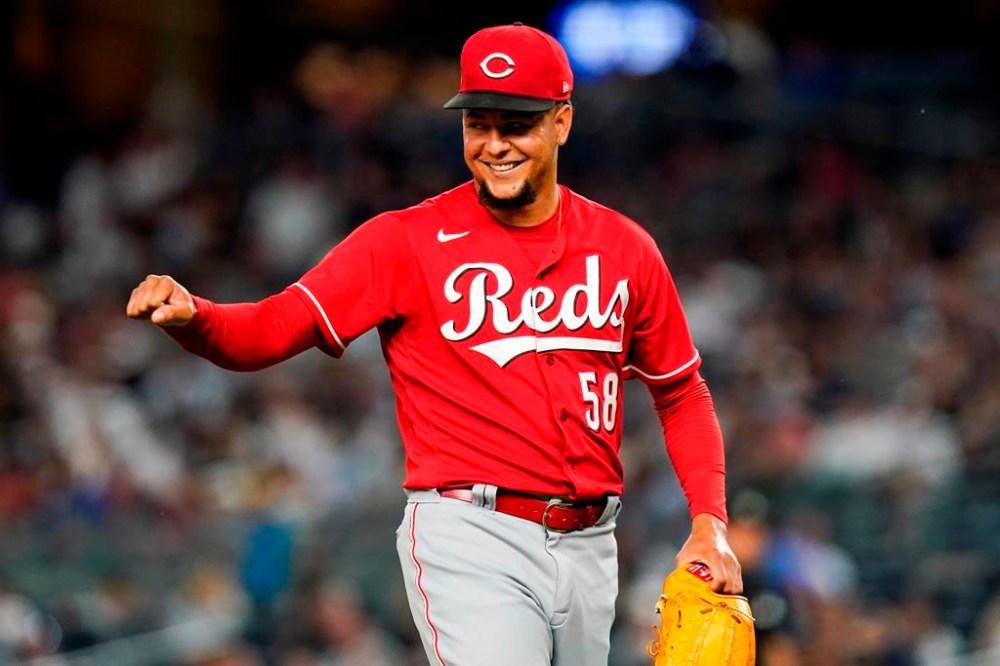 Cincinnati Reds starting pitcher Luis Castillo gestures to a teammate at the end of the sixth inning of the team's baseball game against the New York Yankees on Thursday, July 14, 2022, in New York. (AP Photo/Frank Franklin II)