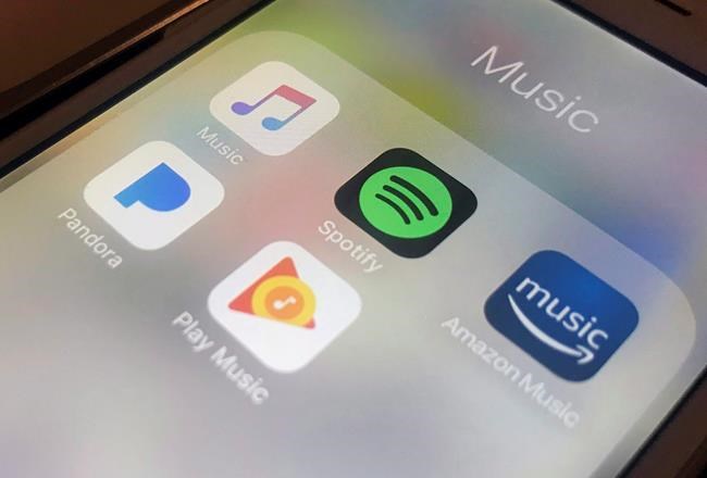 Music streaming apps are shown in this Jan. 28, 2018 file photo. THE CANADIAN PRESS/Jenny Kane-AP