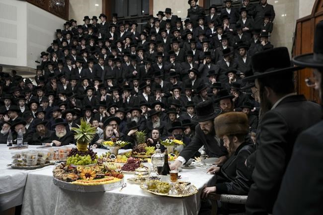 FILE - Ultra-Orthodox Jews of the Sadigura Hasidic dynasty celebrate the Jewish feast of 'Tu Bishvat' or