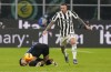 Juventus' Federico Bernardeschi, right, challenges for the ball with Inter Milan's Joaquin Correa during the Italian Super Cup final soccer match between Inter Milan and Juventus at the San Siro Stadium, in Milan, Italy, Wednesday, Jan. 12, 2022. THE CANADIAN PRESS/AP-Luca Bruno