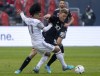 D.C. United defender Julian Gressel (31) fouls Toronto FC forward Jayden Nelson (11) during first half MLS in Toronto on Saturday March 19, 2022.&nbsp;The Vancouver Whitecaps have acquired star German wingback Gressel from D.C. United in exchange for up to US $900,000 in general allocation money.&nbsp;THE CANADIAN PRESS/Frank Gunn