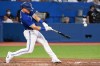 Toronto Blue Jays third baseman Matt Chapman hits a three-run home run against the Kansas City Royals in the fifth inning of American League baseball action in Toronto, Friday, July 15, 2022. THE CANADIAN PRESS/Jon Blacker