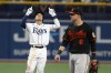 Tampa Bay Rays' Yu Chang gestures after hitting an RBI double against the Baltimore Orioles during the sixth inning of a baseball game Friday, July 15, 2022, in St. Petersburg, Fla. (AP Photo/Scott Audette)