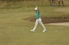 Rory McIlroy of Northern Ireland reacts after holing out of the bunker on the 10th hole during the third round of the British Open golf championship on the Old Course at St. Andrews, Scotland, Saturday July 16, 2022. (AP Photo/Peter Morrison)
