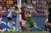 Spain's Athenea del Castillo, left, has a chance to score but is blocked by Denmark's Janni Thomsen, center, and goalkeeper Lene Christensen during the Women Euro 2022 group B soccer match between Denmark and Spain at Brentford Community Stadium in London, England, Saturday, July 16, 2022. (AP Photo/Alessandra Tarantino)
