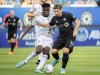 CF Montreal's Matko Miljevic, right, is challenged by Toronto FC's Deandre Kerr during first half MLS soccer action in Montreal, Saturday, July 16, 2022. THE CANADIAN PRESS/Graham Hughes