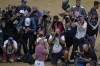 Cameron Smith, of Australia, kisses the claret jug on the 18th green after winning the British Open golf championship on the Old Course at St. Andrews, Scotland, Sunday July 17, 2022.(AP Photo/Alastair Grant)
