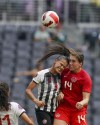 A rock in the heart of the defence and an aerial threat at the end of the pitch, centre back Vanessa Gilles has become an important member of the Canadian women's soccer team. Canada's Gilles (14) and Costa Rica's Maria Paula Coto fight for the ball during a CONCACAF Women's Championship soccer match in Monterrey, Mexico, Monday, July 11, 2022. THE CANADIAN PRESS/AP-Fernando Llano