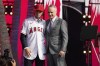 Zach Neto poses for photos with MLB Commissioner Rob Manfred after being selected by the Los Angeles Angels with the 13th pick of the 2022 MLB baseball draft, Sunday, July 17, 2022, in Los Angeles. (AP Photo/Abbie Parr)