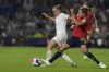 England's Georgia Stanway, left, and Spain's Patri Guijarro challenge for the ball during the Women Euro 2022 quarter final soccer match between England and Spain at the Falmer stadium in Brighton, Wednesday, July 20, 2022. (AP Photo/Alessandra Tarantino)