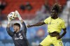 Toronto FC goalkeeper Alex Bono (25) makes a save as Nashville SC forward C.J. Sapong (17) looks on during their MLS soccer game in Toronto, Saturday, September 18, 2021. THE CANADIAN PRESS/Cole Burston