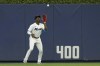 Miami Marlins center fielder Jesus Sanchez catches a ball hit by Texas Rangers' Jonah Heim during the first inning of a baseball game, Thursday, July 21, 2022, in Miami. (AP Photo/Wilfredo Lee)