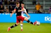 Julian Gressel, left, blocks a pass by Orlando City defender Joao Moutinho, right, during the first half of an MLS soccer match, in Orlando, Fla., Saturday, Oct. 2, 2021. Gressel is the newest addition to the Vancouver Whitecaps' lineup.THE CANADIAN PRESS/AP-John Raoux