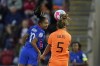 France's Selma Bacha jumps for the ball with Netherlands' Lynn Wilms, right, during the Women Euro 2022 quarterfinals soccer match between France and the Netherlands at the New York Stadium in Rotherham, England, Saturday, July 23, 2022. (AP Photo/Jon Super)