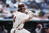 FILE - Philadelphia Phillies' Pete Rose bats during a 1980 baseball game. Rose will make an appearance on the field in Philadelphia next month. Baseball’s career hits leader will be part of Phillies alumni weekend, and will be introduced on the field alongside many former teammates from the 1980 World Series championship team on Aug. 7. (AP Photo, File)