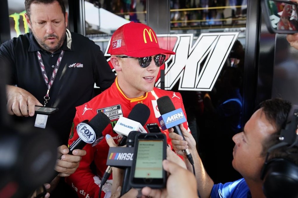 NASCAR driver Ty Gibbs talks to reporters before an auto race at Pocono Raceway, Sunday, July 24, 2022 in Long Pond, Pa. (AP Photo/Matt Slocum)