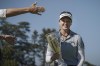Brooke Henderson, of Canada, celebrates with her trophy after winning the Evian Championship women's golf tournament in Evian, eastern France, Sunday, July 24, 2022. (AP Photo/Laurent Cipriani)