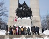 People surround the Tomb of the Unknown Soldier at the National War Memorial during a rally against COVID-19 restrictions in Ottawa, which began as a cross-country convoy protesting a federal vaccine mandate for truckers, on Sunday, Jan. 30, 2022.The federal government is facing fresh calls to increase security at the National War Memorial and Tomb of the Unknown Soldier. THE CANADIAN PRESS/Justin Tang