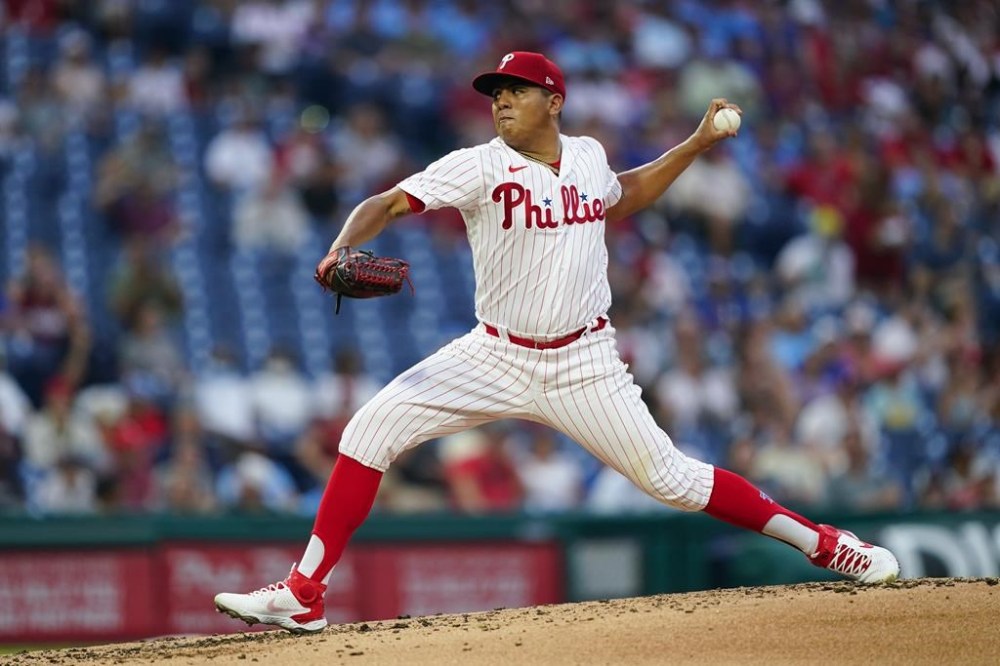 Philadelphia Phillies' Ranger Suarez pitches during the third inning of a baseball game against the Atlanta Braves, Monday, July 25, 2022, in Philadelphia. (AP Photo/Matt Rourke)