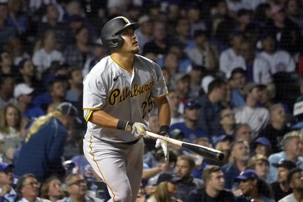 Pittsburgh Pirates' Yoshi Tsutsugo watches his fly out to Chicago Cubs right fielder Seiya Suzuki during the seventh inning of a baseball game, Monday, July 25, 2022, in Chicago. (AP Photo/Charles Rex Arbogast)