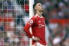 FILE- Manchester United's Cristiano Ronaldo rests against a goalpost during the English Premier League soccer match between Manchester United and Norwich City at Old Trafford stadium in Manchester, England, on April 16, 2022. By Thursday, July 21, 2022, Cristiano Ronaldo has not yet returned to preseason training with Manchester United because of what has been publicly described as “personal reasons.” Ronaldo reportedly wants out after only one season back at Old Trafford because United is no longer in the Champions League or in shape to compete with the best teams in England. (AP Photo/Jon Super, File)