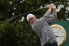 Jason Kokrak of the US plays off the 3rd tee during the first round of the British Open golf championship on the Old Course at St. Andrews, Scotland, Thursday, July 14 2022. The Open Championship returns to the home of golf on July 14-17, 2022, to celebrate the 150th edition of the sport's oldest championship, which dates to 1860 and was first played at St. Andrews in 1873. (AP Photo/Alastair Grant)