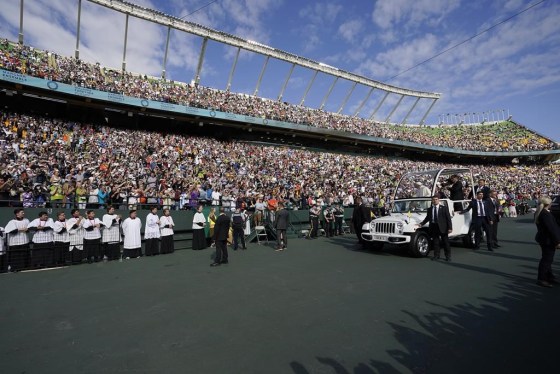 Pope Francis arrives to deliver an open air Mass at Commonwealth Stadium. (Eric Gay / The Associated Press)