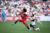 Toronto FC's Jayden Nelson (11) and Vancouver Whitecaps' Russell Teibert (31) vie for the ball during the first half of the Canadian Championship soccer final, in Vancouver, on Tuesday, July 26, 2022. THE CANADIAN PRESS/Darryl Dyck