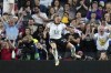 Germany's Alexandra Popp celebrates after scoring the opening goal during the Women Euro 2022 semifinal soccer match between Germany and France at Stadium MK in Milton Keynes, England, Wednesday, July 27, 2022. (AP Photo/Alessandra Tarantino)