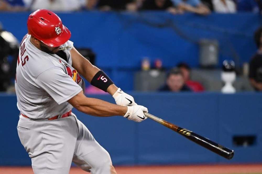St. Louis Cardinals’ Albert Pujols hits a three-run home run against the Toronto Blue Jays in the fifth inning of interleague MLB baseball action in Toronto, Wednesday, July 27, 2022. THE CANADIAN PRESS/Jon Blacker