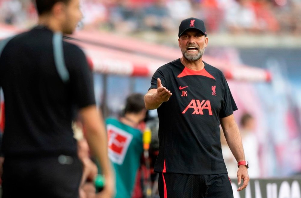Liverpool coach Juergen Klopp reacts during the friendly match between Liverpool and Leipzig, at the Red Bull Arena in Leipzig, Germany, Thursday, July 21, 2022. (Hendrik Schmidt/dpa via AP)