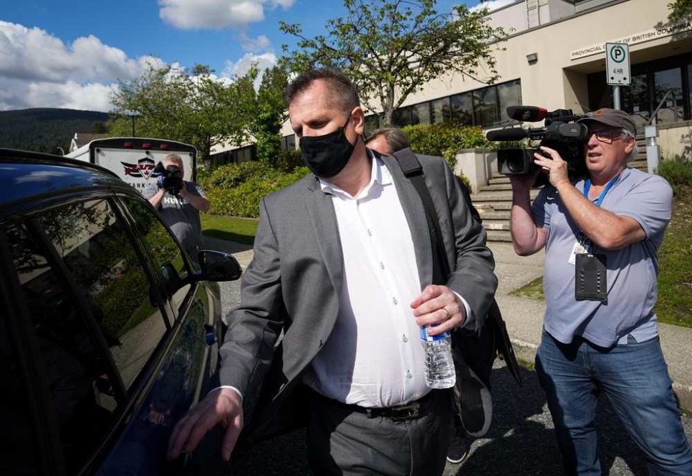 Bob Birarda leaves provincial court, in North Vancouver, B.C., on Wednesday, June 8, 2022. An independent review has concluded that Canada Soccer