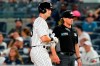 New York Yankees' Andrew Benintendi reacts after hitting a fly out during the ninth inning of a baseball game against the Kansas City Royals Thursday, July 28, 2022, in New York. The Yankees won 1-0. (AP Photo/Frank Franklin II)