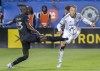 CF Montreal's Kei Kamara, left, challenges Toronto FC's Domenico Criscito during second half MLS soccer action in Montreal, Saturday, July 16, 2022. THE CANADIAN PRESS/Graham Hughes