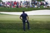 Phil Mickelson lines up a shot on the 16th hole during the first round of the Bedminster Invitational LIV Golf tournament in Bedminster, N.J., Friday, July 29, 2022. (AP Photo/Seth Wenig)