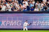 Fans cheer after New York Yankees' Aaron Judge caught a ball hit by Kansas City Royals' MJ Melendez for an out during the first inning of a baseball game Friday, July 29, 2022, in New York. (AP Photo/Frank Franklin II)