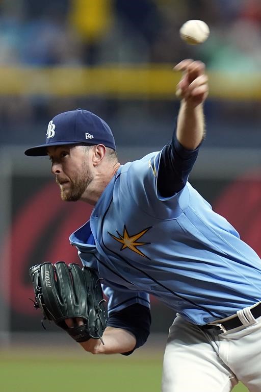 Tampa Bay Rays' Jeffrey Springs pitches to the Cleveland Guardians during the first inning of a baseball game Friday, July 29, 2022, in St. Petersburg, Fla. (AP Photo/Chris O'Meara)