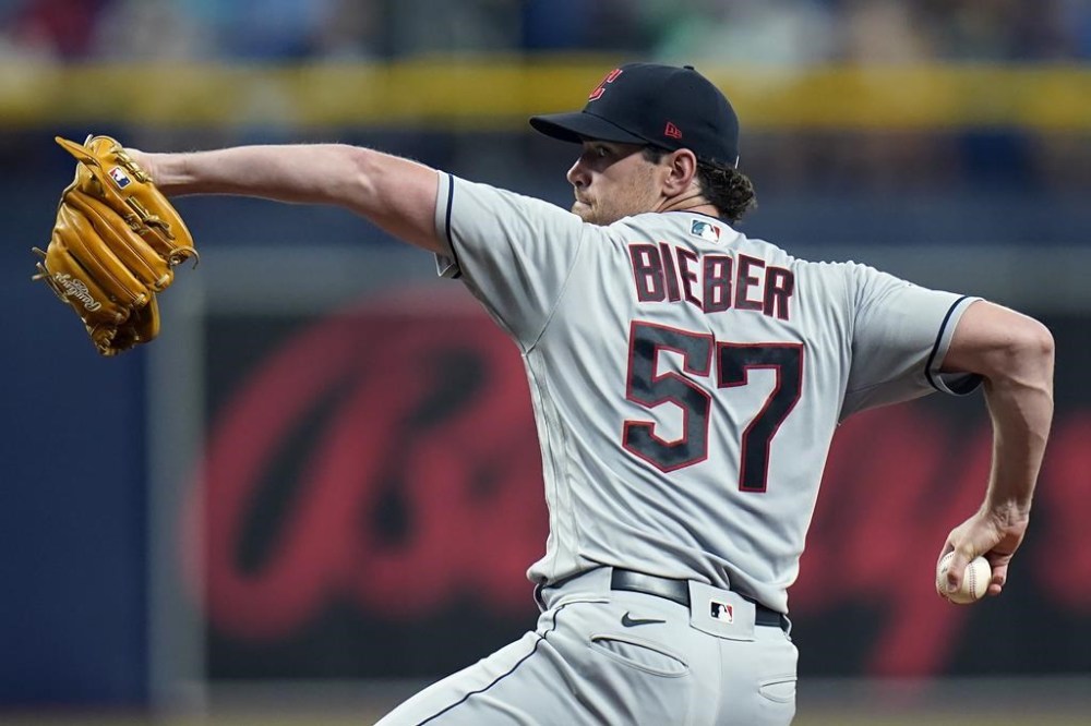 Cleveland Guardians starting pitcher Shane Bieber delivers to the Tampa Bay Rays during the first inning of a baseball game Friday, July 29, 2022, in St. Petersburg, Fla. (AP Photo/Chris O'Meara)