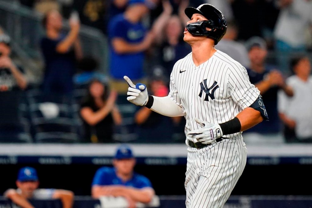 New York Yankees' Aaron Judge gestures as he reaches home plate after hitting a grand slam during the eighth inning of a baseball game against the Kansas City Royals, Friday, July 29, 2022, in New York. (AP Photo/Frank Franklin II)