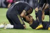 Los Angeles FC forward Carlos Vela, right, is congratulated by Eddie Segura for his goal during the first half of the team's MLS soccer match against the Seattle Sounders on Friday, July 29, 2022, in Los Angeles. (AP Photo/Ringo H.W. Chiu)