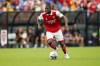 Arsenal defender Nuno Tavares controls the ball against Everton during the first half of a pre-season friendly soccer match, Saturday, July 16, 2022, in Baltimore. (AP Photo/Julio Cortez)