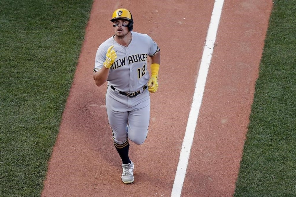 Milwaukee Brewers' Hunter Renfroe celebrates his two-run home run against the Boston Red Sox during the fifth inning of a baseball game Saturday, July 30, 2022, in Boston. (AP Photo/Michael Dwyer)