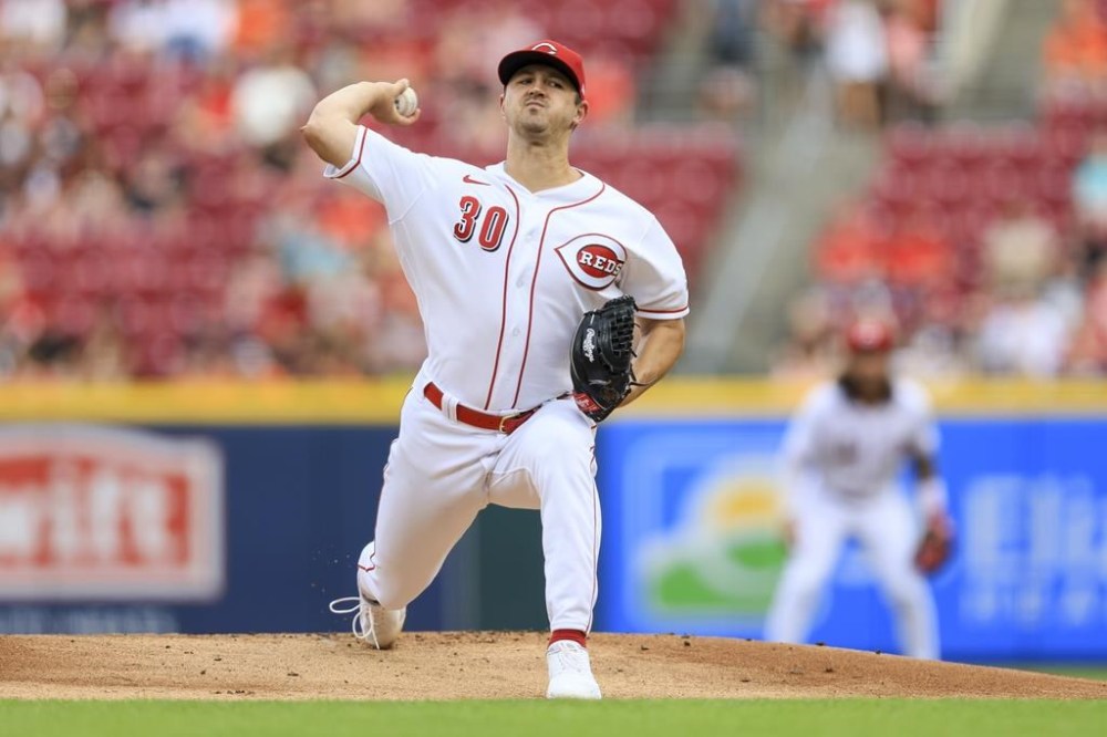 Cincinnati Reds' Tyler Mahle throws during the first inning of a baseball game against the Baltimore Orioles in Cincinnati, Saturday, July 30, 2022. (AP Photo/Aaron Doster)