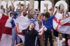 England supporters react as they gather in the fan zone in Trafalgar Square to watch on a big screen the final of the Women's Euro 2020 soccer match between England and Germany being played at Wembley stadium in London, Sunday, July 31, 2022. (AP Photo/Frank Augstein)