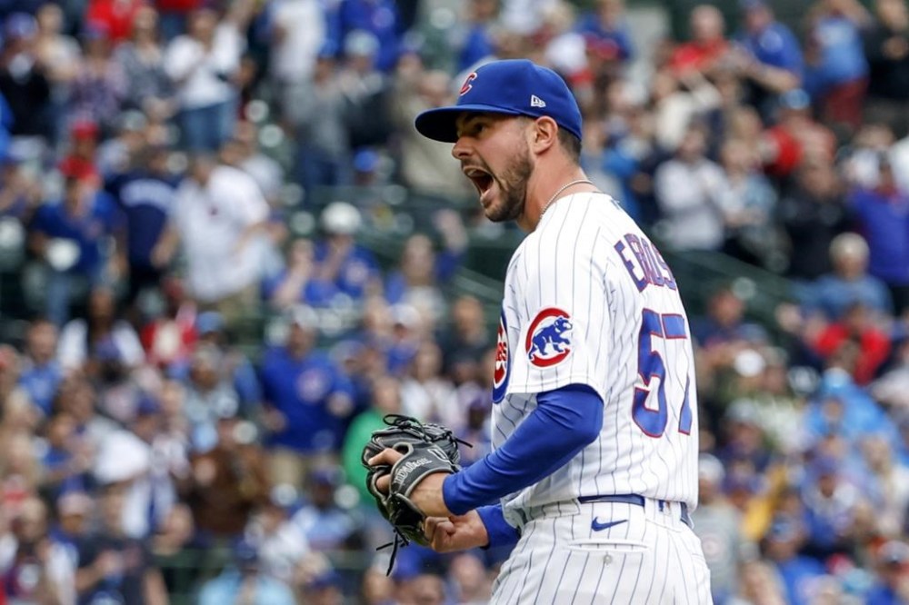 FILE - Chicago Cubs relief pitcher Scott Effross reacts after striking out St. Louis Cardinals' Tommy Edman with the bases loaded during the seventh inning of the first baseball game of a doubleheader, on June 4, 2022, in Chicago. The New York Yankees acquired Effross in a trade with the Cubs on Monday, AUg. 1, 2022. (AP Photo/Kamil Krzaczynski, File)